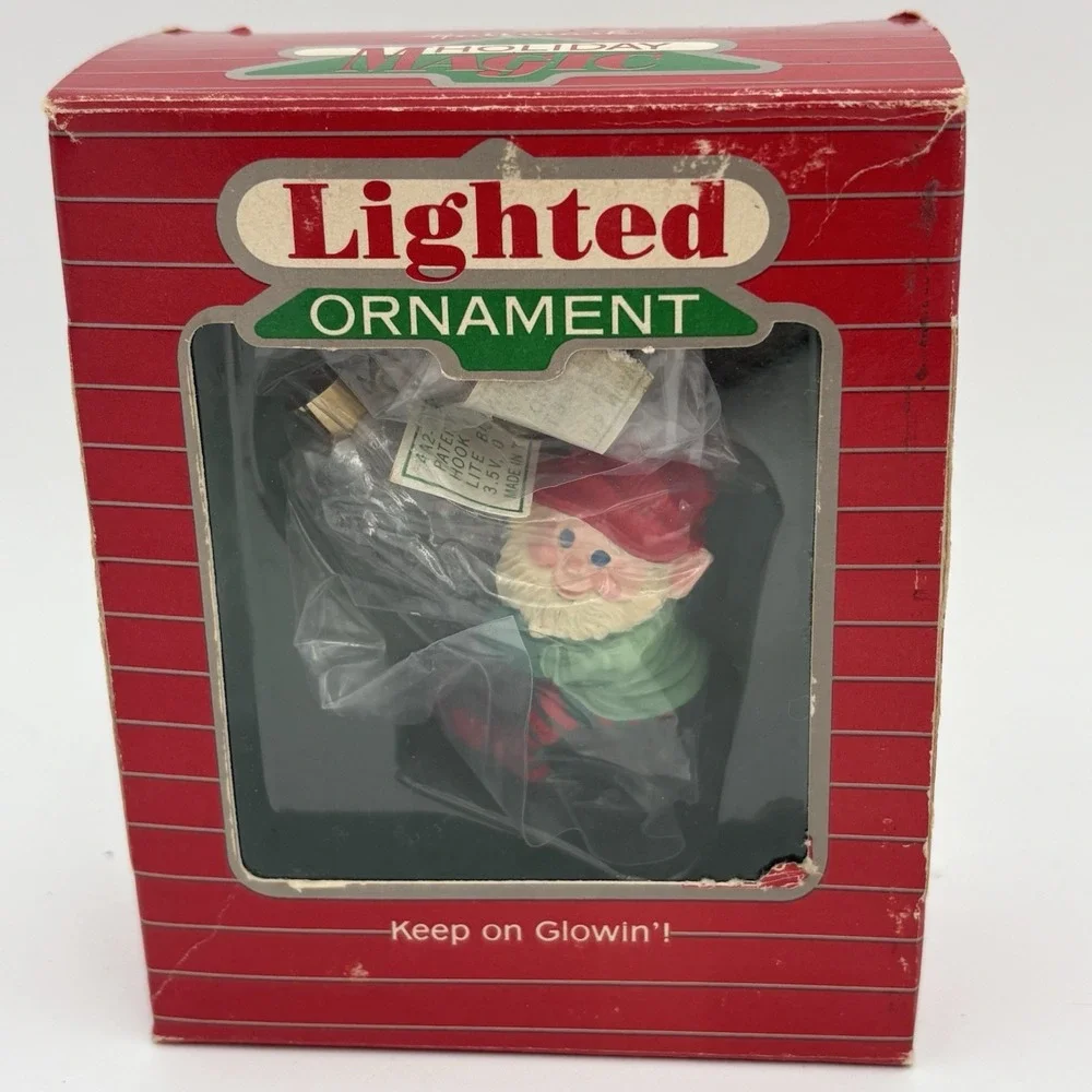 Hallmark Holiday Magic Lighted Ornament 1986 Elf with Icicle Keep on Glowin'‎